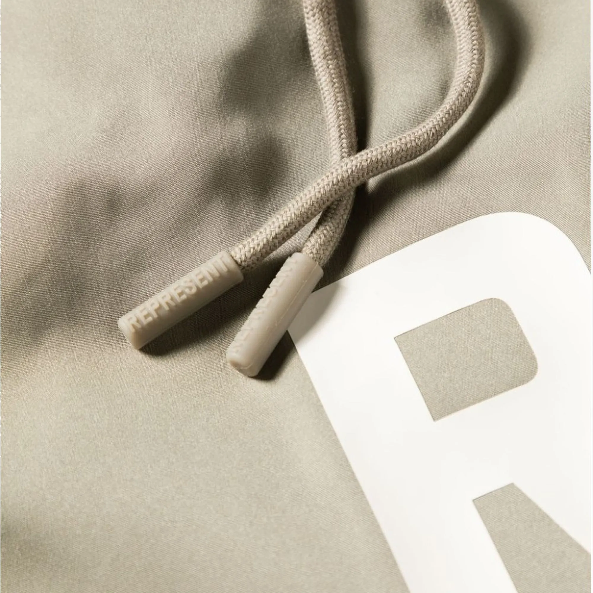 Represent | SWIM SHORTS  { KHAKI